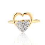 Gold heart-shaped ring with diamond details on a white background