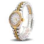 Luxury watch with two-tone gold and silver band on white background