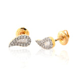 Gold and diamond earrings on a white background
