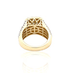 Gold ring with intricate design and small diamonds on a white background