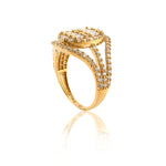 Gold ring with diamond accents on a white background