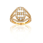 Gold ring with diamond accents on a white background