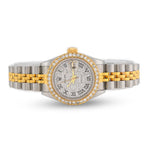 Luxury watch with two-tone band on a white background