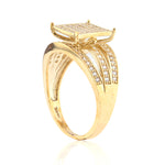 Gold ring with diamond accents on a white background
