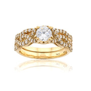 Gold ring with a diamond on a white background