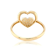Gold heart-shaped ring with open design on a white background