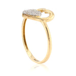 Gold ring with heart-shaped diamond design on a white background