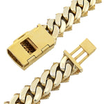 Gold chain bracelet with a clasp on a white background