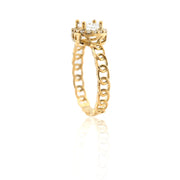 Gold ring with a diamond on a white background