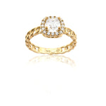 Gold ring with a diamond on a white background