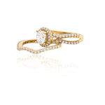 Gold ring with a diamond on a white background