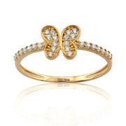 Gold butterfly ring with diamond accents on a white background