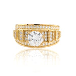 Gold ring with a large diamond and smaller diamonds on a white background