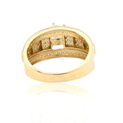 Gold ring with diamond accents on a white background
