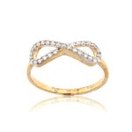 Gold infinity ring with diamonds on a white background