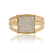 Gold ring with diamond accents on a white background