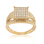 Gold ring with diamond accents on a white background