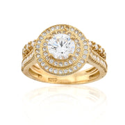 Gold ring with a large diamond and smaller diamonds on a white background